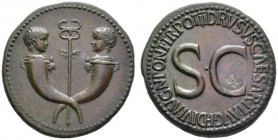 The Roman Empire   In the name of Drusus, son of Tiberius  Sestertius 22-23, Æ 26.89 g. Confronted heads of two little boys on crossed cornucopiae wit...