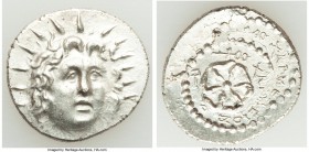 CARIAN ISLANDS. Rhodes. Ca. 84-30 BC. AR drachm (20mm, 4.08 gm, 6h). AU, double struck. Charmios, magistrate. Radiate head of Helios facing, turned sl...
