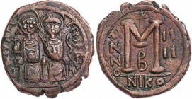 BYZANZ
Iustinus II., 565-578. AE-Follis 568/569 (= Jahr 4) Nikomedia, 2. Offizin Vs.: D N IVSTI-NVS PP AVC (AV ligiert), Iustinus und Sophia thronen ...