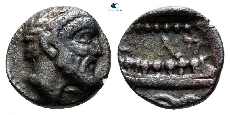 Phoenicia. Arados 380-350 BC. 
Obol AR

8 mm., 0.68 g.



very fine