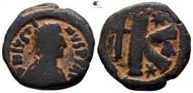Justin I AD 518-527. Constantinople. Half follis Æ