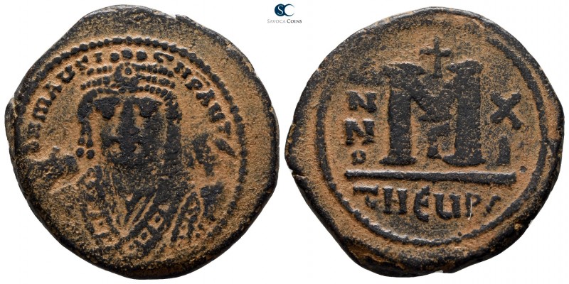 Maurice Tiberius AD 582-602. Theoupolis (Antioch)
Follis Æ

28 mm., 11.95 g....