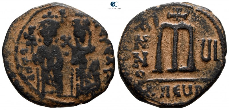 Phocas, with Leontia AD 602-610. Theoupolis (Antioch)
Follis Æ

27 mm., 8.73 ...