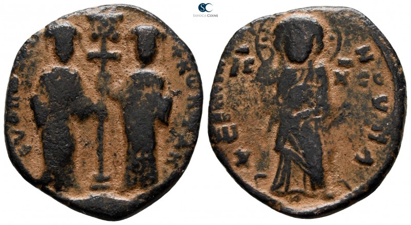 Constantine X Ducas and Eudocia AD 1059-1067. Constantinople
Follis Æ

26 mm....