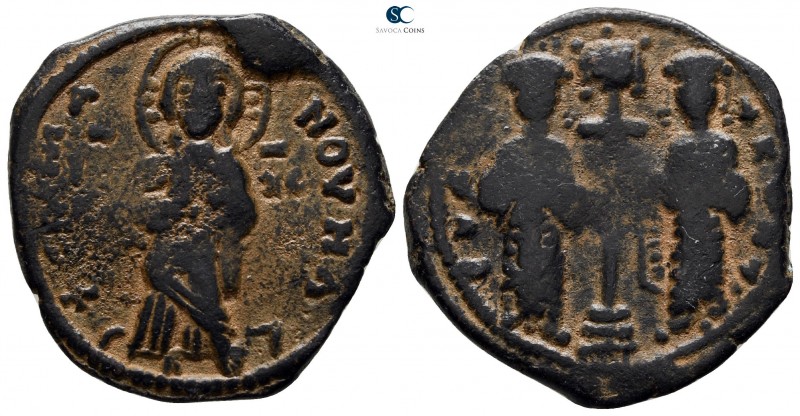 Constantine X Ducas and Eudocia AD 1059-1067. Constantinople
Follis Æ

26 mm....