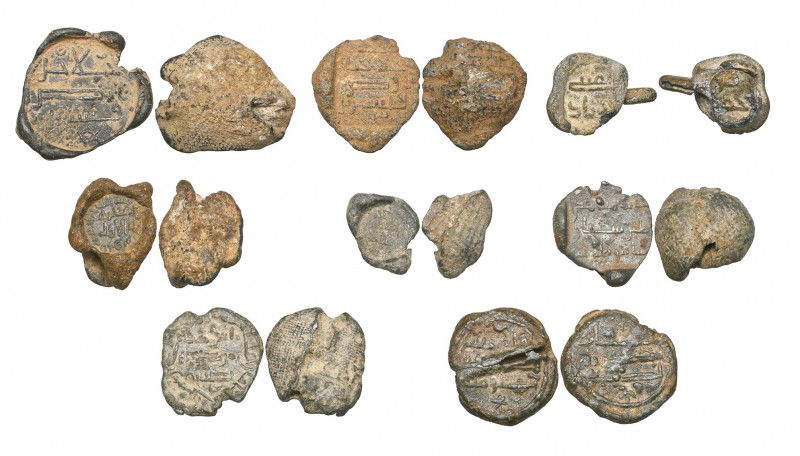 A COLLECTION OF EIGHT EARLY ISLAMIC LEAD SEALS, Umayyad and later, comprising: U...