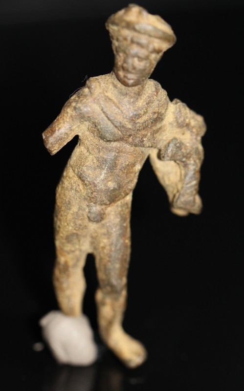 2nd-3rd century AD. Bronze figure of Mercury (Greek Hermes) standing dressed in ...