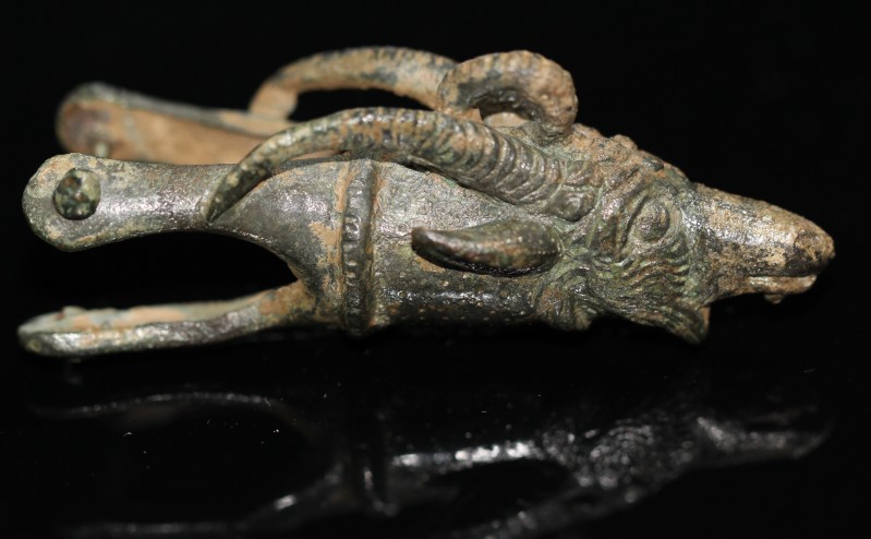1st-2nd century AD. Bronze mount in the shape of a goat with impressive detail w...