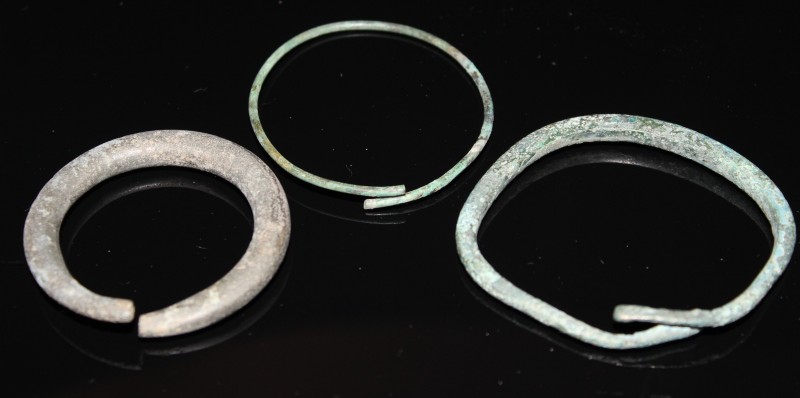 2nd millenium BC. A group of three bronze bracelets. Fine condition. Provenance:...