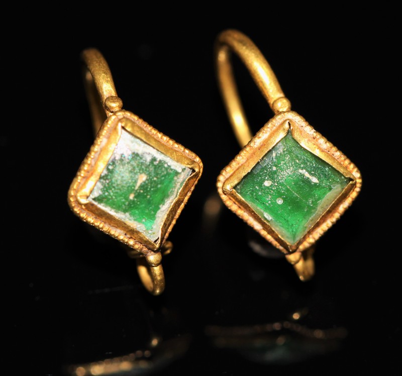 2nd - 3rd century AD. A pair of gold hoop earrings with green glass beads. Very ...