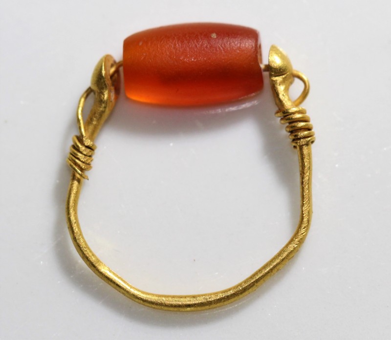 4th-3rd century BC. Gold wire, with attached carnelian gem stone, not engraved. ...