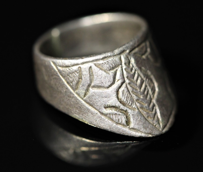 8th-10th century AD. Solid silver engraved archer thumb ring. Very small example...