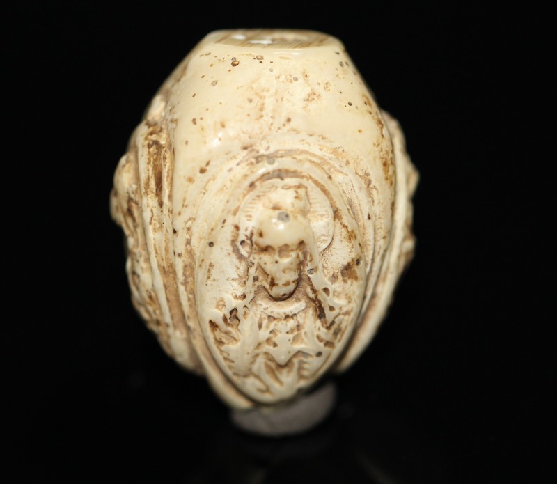 17th century. An ivory carved bead, showing scenes from the life of Christ. Such...
