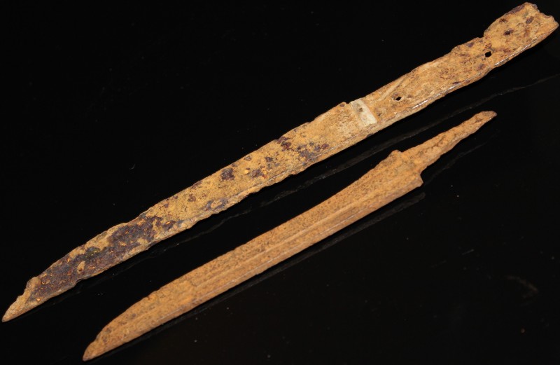 13th - 15th century AD. Two iron single-edged scale-tang knife blades in fair co...