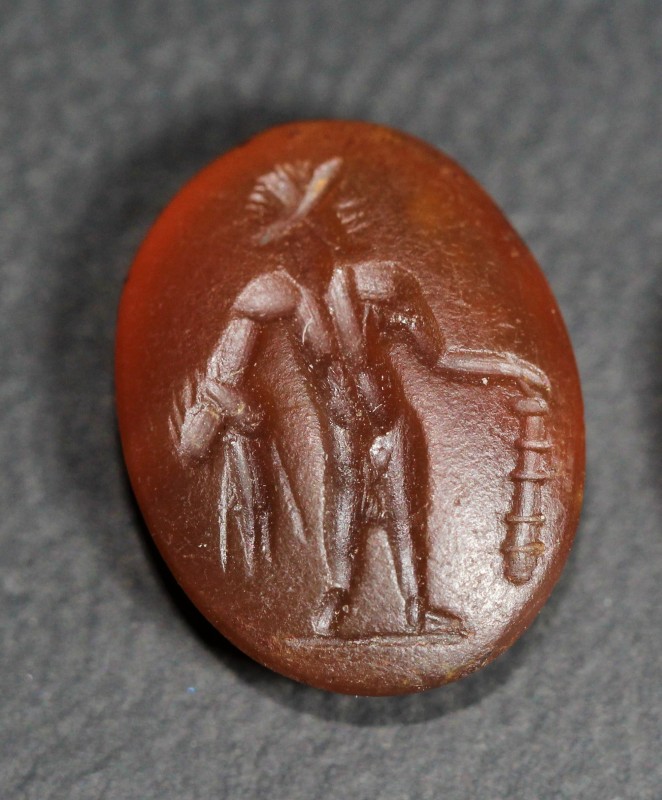 2nd - 1st century BC. Carnelian - agate, dark red opaque stone with the image of...
