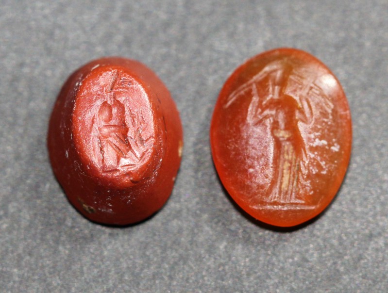 1st century AD. Two gemstones. One carnelian depicting Venus; one red jasper int...
