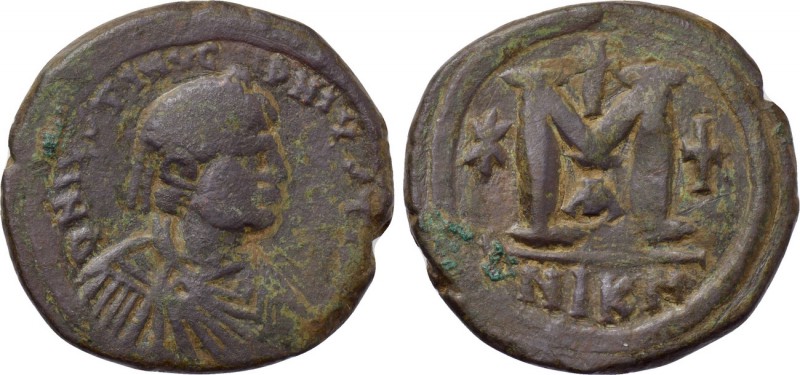JUSTIN I & JUSTINIAN I (527). Follis. Nicomedia. 

Obv: Diademed, draped and c...