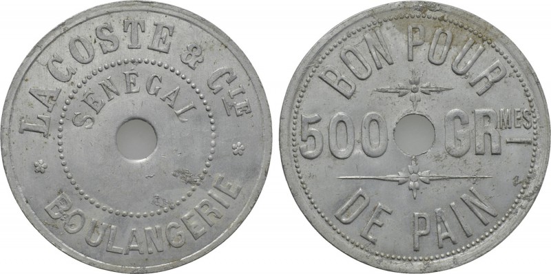 FRENCH COLONIES. Senegal. Aluminum Bread Token. Good for 500 grams. 

Obv: LAC...