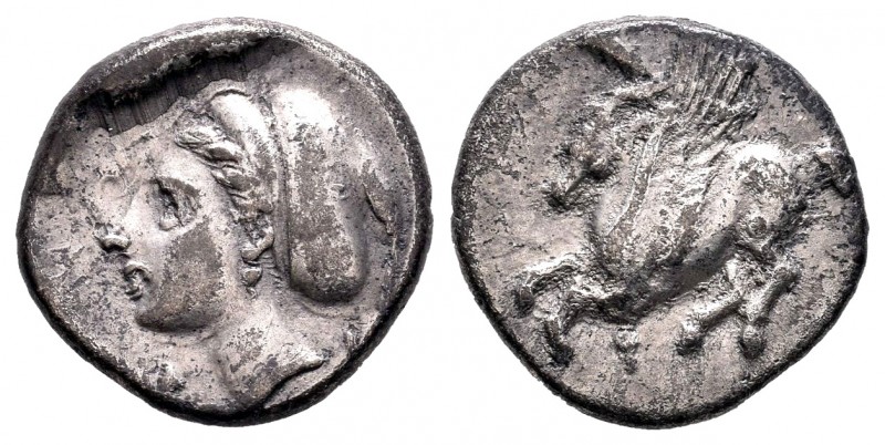 Corintia. Dracma. 308-306 a.C. (Gc-2643). Anv.: Pegaso a izquierda. Rev.: Cabeza...