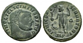 Licinio I. Follis. 313-315 d.C. Siscia. (Spink-15211). (Ric-8). Rev.: IOVI CONSERVATORI, en exergo SIS. Júpiter de pie con con cetro y sosteniendo a V...