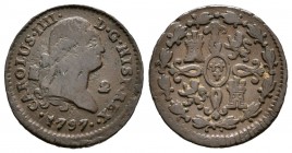 Carlos IV (1788-1808). 2 maravedís. 1797. Segovia. (Cal 2008-1530 variante). Ae. 2,36 g. Dos puntos a la derecha de la fecha. BC+. Est...20,00. Englis...