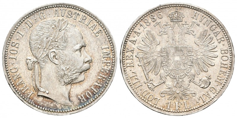 Austria. Franz Joseph I. 1 florín. 1886. (Km-2222). Ag. 12,33 g. Restos de brill...