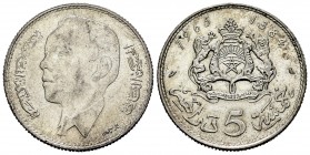 Marruecos. Al Hassan II. 5 dinares. 1384 H (1965). (Km-57). Ag. 11,75 g. Restos de brillo original. EBC. Est...18,00. English: Morocoo. Al Hassan II. ...