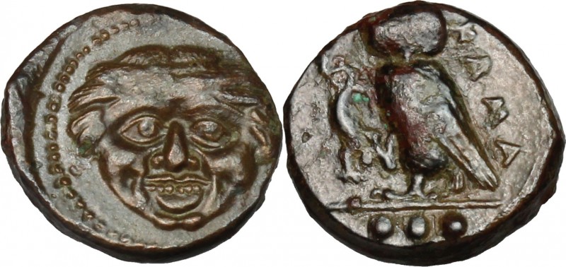 Sicily. Kamarina. AE Tetras, 425-405 BC. D/ Gorgoneion. R/ Owl standing left, he...