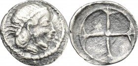 Sicily. Syracuse. AR Obol, 485-465 BC. D/ Head of Arethusa right, diademed. R/ Wheel with four spokes. SNG Cop. 632. AR. g. 0.33 mm. 9.00 VF.
