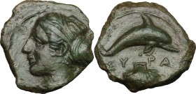 Sicily. Syracuse. Dionysios I (405-367 BC). AE Hemilitron. D/ Head of Arethusa left. R/ Dolphin right; below, scallop shell. CNS II, 24. AE. g. 2.94 m...
