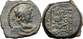 Greek Asia. Syria, Seleucid Kings. Antiochos VII Euergetes (138-129 BC). AE, 138-129 BC. D/ Bust of Eros right. R/ Headdress of Isis with lotos-flower...