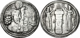 Greek Asia. Sasanian kings of Persia. Vahrām (Bahram) II (276-293). AR Drachm. D/ Jugate busts of king, wearing winged crown with korymbos, and his qu...