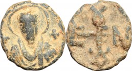 PB Bulla, 6th-7th century. D/ Bust of a saint facing, nimbate. R/ Monogram. PB. g. 6.52 mm. 18.00 VF.