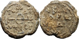 PB Seal, 8th-12th century. D/ Cruciform invocative monogram. R/ Inscription in four lines. Lead. g. 21.63 mm. 30.00 Good VF/VF.