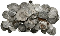 MONARQUIA ESPAÑOLA. Lote compuesto por 50 monedas de plata macuquinas y redondas de Felipe V a Carlos III, conteniendo: 9 piezas 1/2 Real, 20 de 1 Rea...