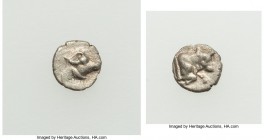 CARIA. Uncertain mint. Ca. 4th century BC. AR tetartemorion (6mm, 0.20 gm, 7h). About XF. Head of bull right / Forepart of bull right with dotted trun...