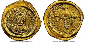Justinian I the Great (AD 527-565). AV solidus (22mm, 4.46 gm, 7h). NGC MS 2/5 - 5/5, flan flaw, rotated double strike. Constantinople, 6th officina. ...