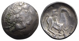 Celtic, Eastern Europe, imitating Philip II of Macedon, 2nd century BC. AR Tetradrachm (26mm, 12.15g, 6h). Kinnlos (Chinless) type. Celticized head of...