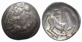 Celtic, Eastern Europe, imitating Philip II of Macedon, 2nd century BC. AR Tetradrachm (26mm, 11.78g, 6h). Kinnlos (Chinless) type. Celticized head of...