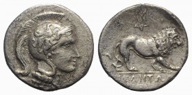 Northern Lucania, Velia, c. 300-280 BC. AR Stater (21.5mm, 6.79g, 6h). Head of Athena r., wearing crested Attic helmet decorated with griffin; Δ above...