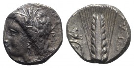 Southern Lucania, Metapontion, c. 330-290 BC. AR Stater (19mm, 7.76g, 6h). Wreathed head of Demeter l. R/ Barley ear with leaf to l.; above leaf, grif...