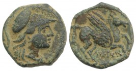 Bruttium, Lokroi Epizephyrioi, c. 270-200 BC. Æ (14mm, 2.79g, 7h). Helmeted head of Athena r. R/ Pegasos flying r. HNItaly 2423. Green patina, near VF...