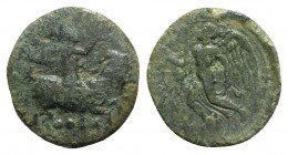Sicily, Himera, c. 420-415 BC. Æ Hexas (15mm, 2.07g, 12h). Pan as a youth, holding thyrsos over his shoulder and blowing on a conch shell, seated on g...