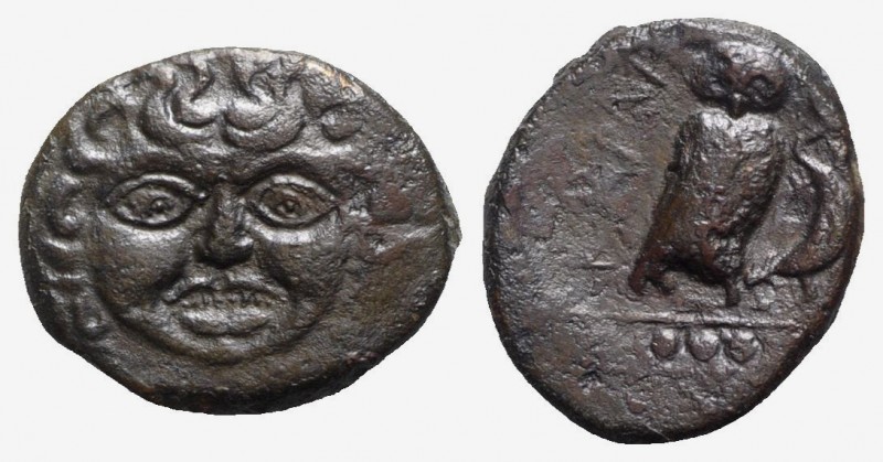 Sicily, Kamarina, c. 420-405 BC. Æ Tetras (17.5mm, 4.07g, 3h). Facing gorgoneion...