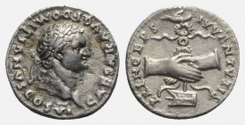 Domitian (Caesar, 69-81). AR Denarius (17mm, 2.93g, 6h). Rome, AD 79. Laureate head r. R/ Clasped r. hands holding aquila set on prow. RIC II 1081 (Ve...