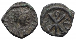 Justin I (518-527). Æ 5 Nummi (11mm, 2.04g, 1h). Constantinople. Diademed, draped and cuirassed bust r. R/ Large Christogram between B and Є. MIBE 32;...