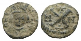 Heraclius (610-641). Æ 10 Nummi (13mm, 1.75g, 9h). Carthage. Helmeted, draped and cuirassed bust facing. R/ Large X; N-M across field; cross above, st...