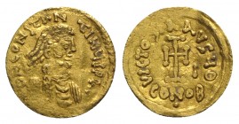 Constans II (641-668). AV Tremissis (13mm, 1.50g, 6h). Syracuse, c. 646-648. Diadmed, draped and cuirassed bust r. R/ Cross potent; I to r., pellet be...