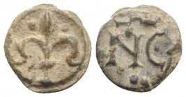 South Italy, c. 13th-14th century. PB Tessera (16mm, 3.23g, 12h). Fleur-de-lis with two pellets. R/ Large NC surmounted by omega. Green patina, Good V...