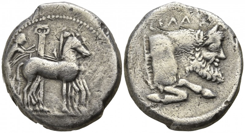 Sicily. Gela circa 450-440 BC.
Tetradrachm AR

27mm., 16,74g.

Charioteer, ...